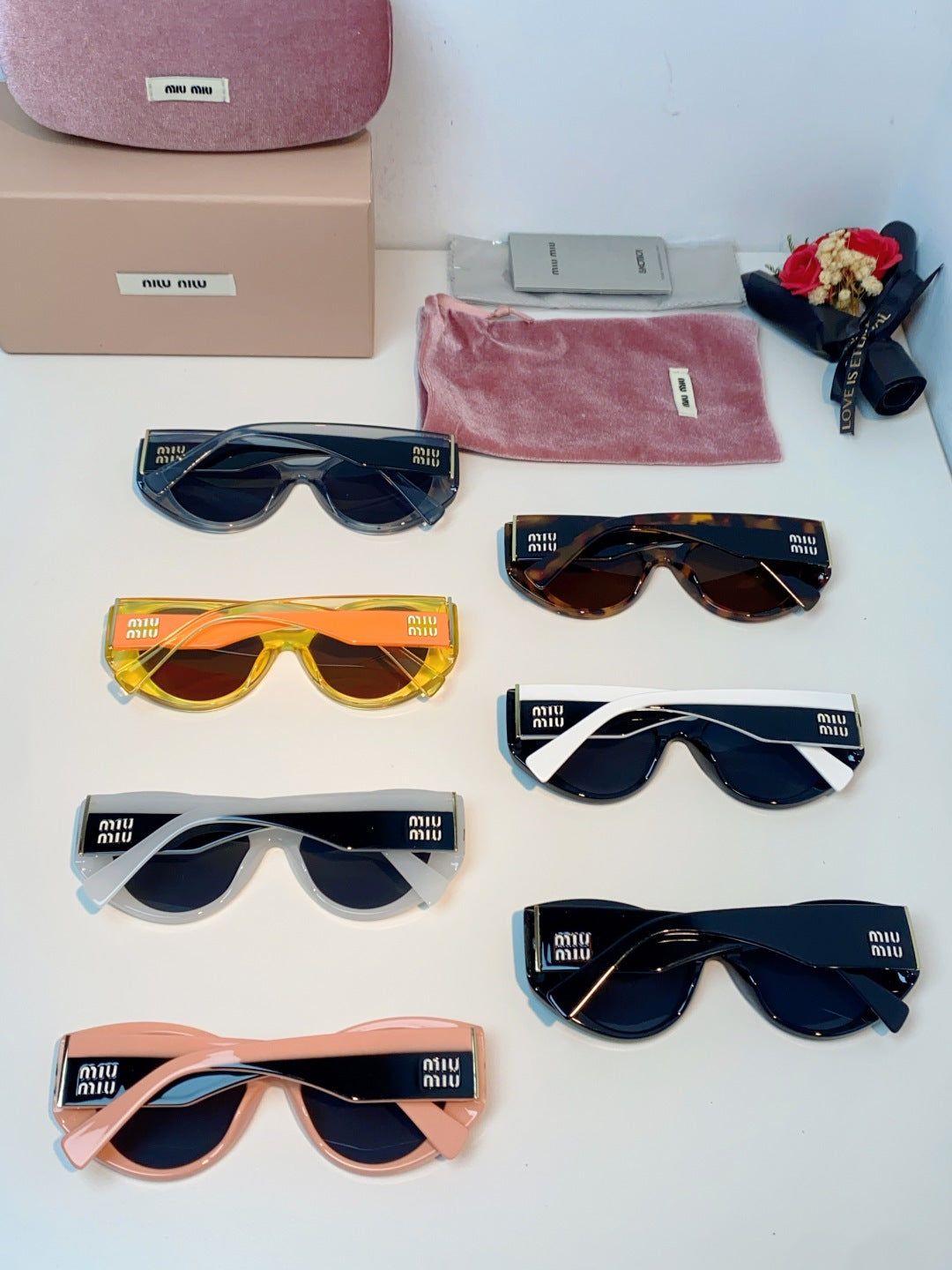Miu Miu Polarized Cat-Eye Blue Lens Sunglasses for Men & Women - detail image 11