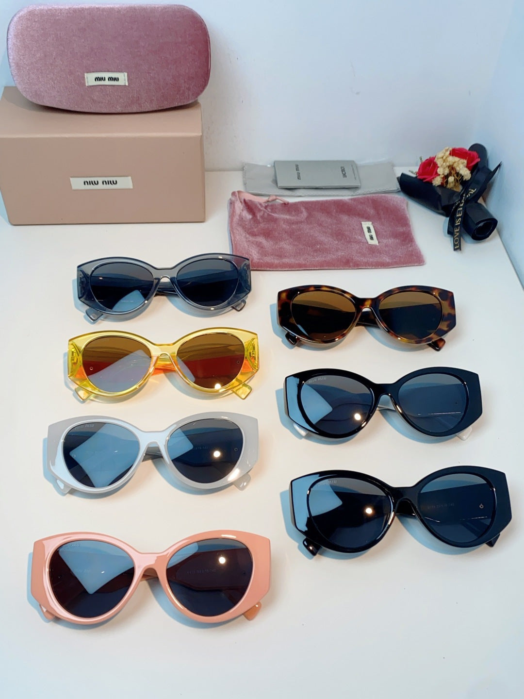 Miu Miu Polarized Cat-Eye Orange Lens Sunglasses for Men & Women - detail image 12