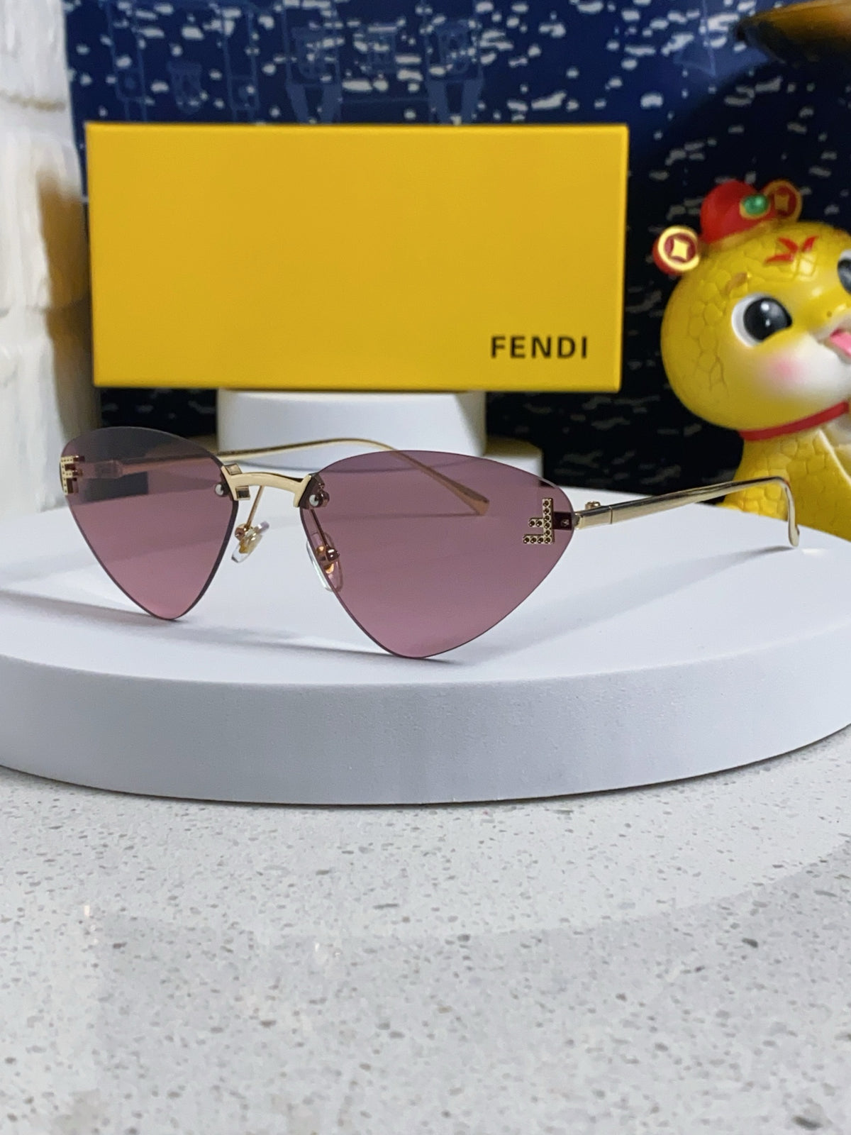 Fendi Lightweight Rimless Purple Lens Sunglasses for Women
